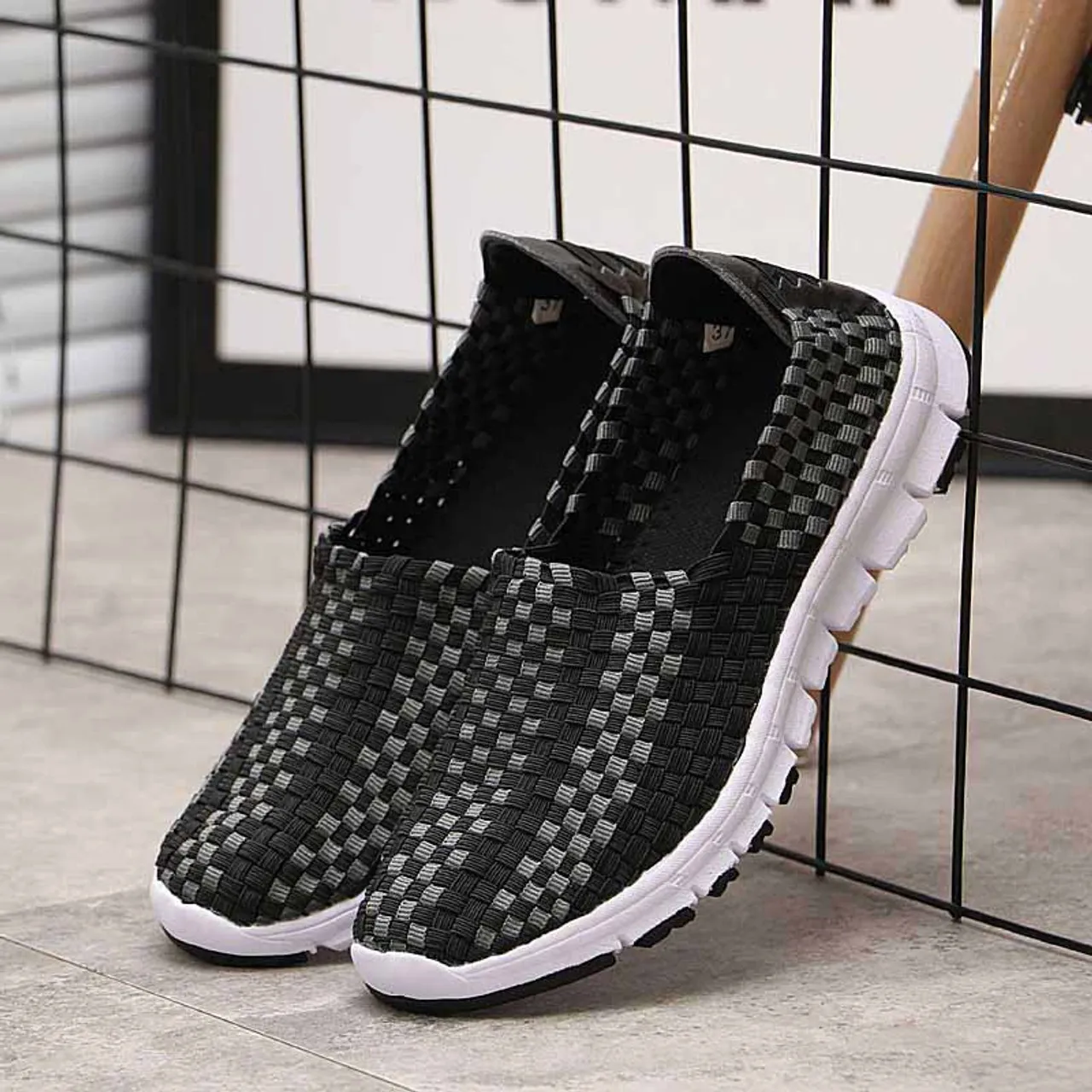 Black check weave casual slip on shoe sneaker