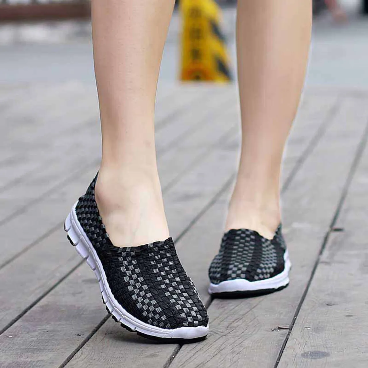 Black check weave casual slip on shoe sneaker