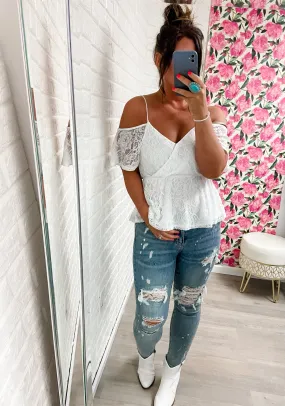 Mid-Rise Lace Patch Skinny Jeans