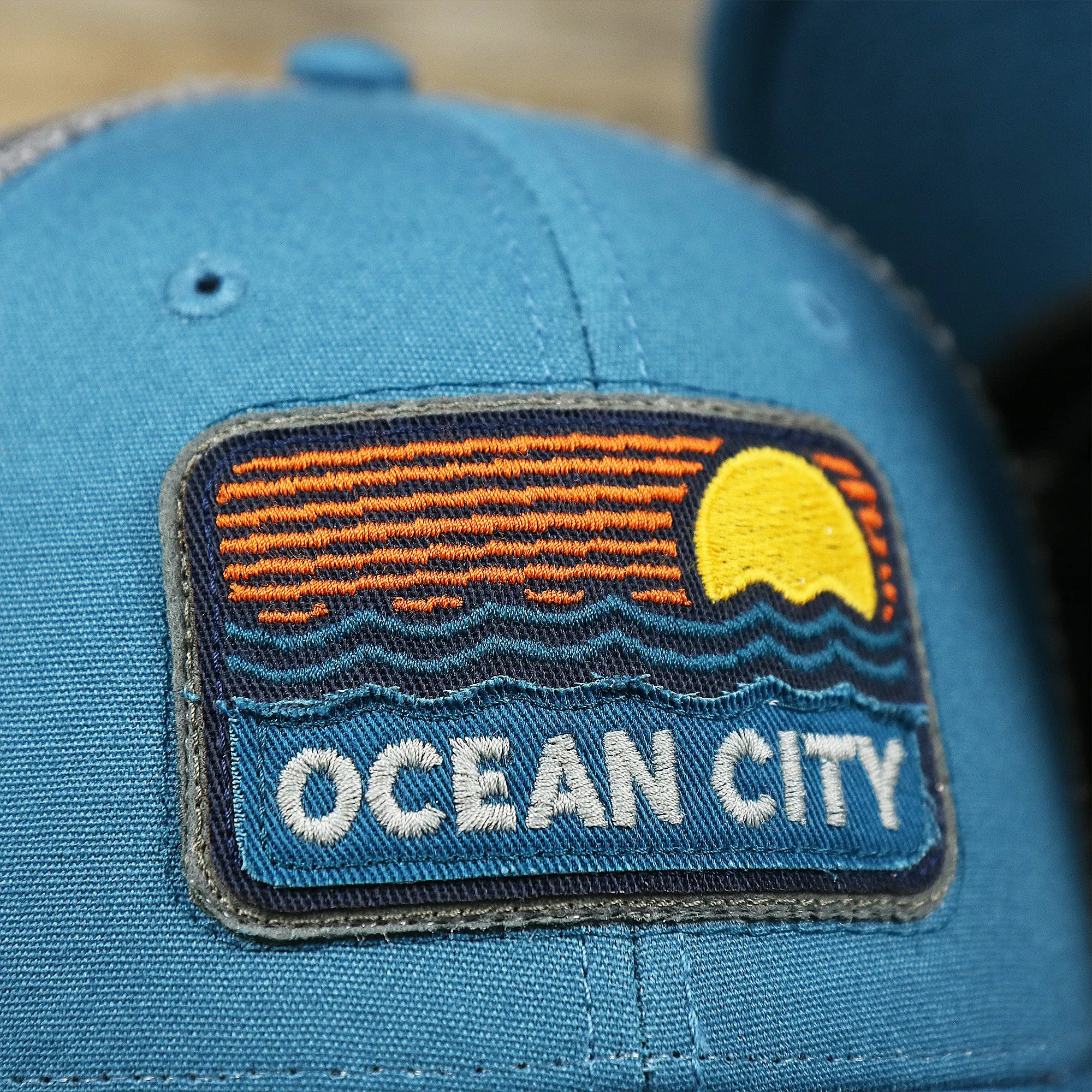 Youth New Jersey Ocean City Sunset Mesh Back Trucker Hat | Marine Blue And Dark Gray Mesh Youth Trucker Hat