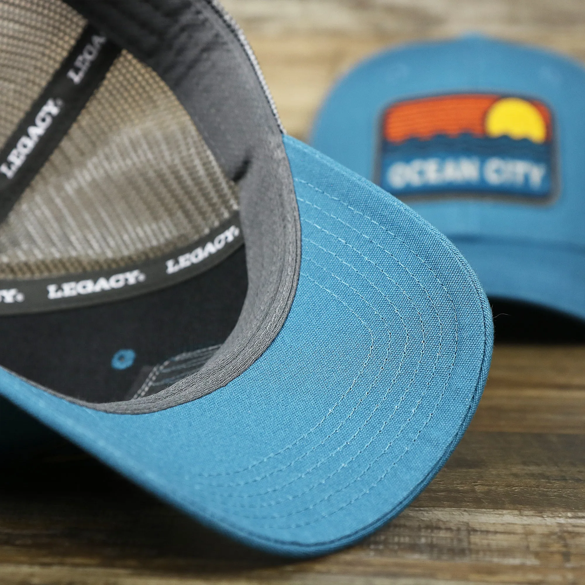 Youth New Jersey Ocean City Sunset Mesh Back Trucker Hat | Marine Blue And Dark Gray Mesh Youth Trucker Hat