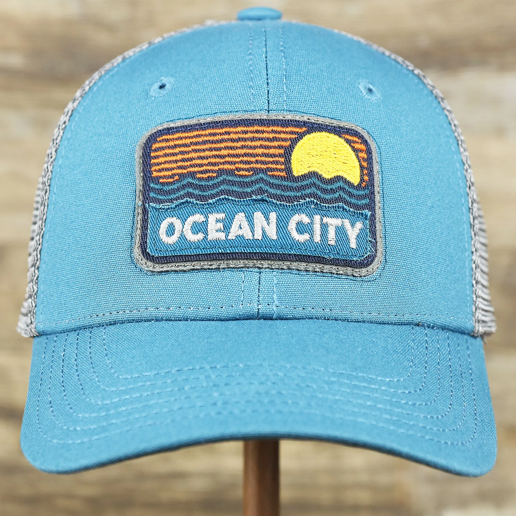 Youth New Jersey Ocean City Sunset Mesh Back Trucker Hat | Marine Blue And Dark Gray Mesh Youth Trucker Hat